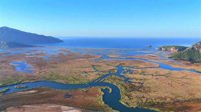 Iztuzu beach. Iztuzu Beach is located 12 kilometers from Dalyan town. You can reach this beach by boat or road.  