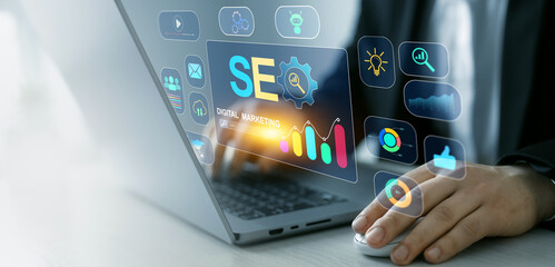 Search engine optimization marketing and online traffic on website.Business person who using a...