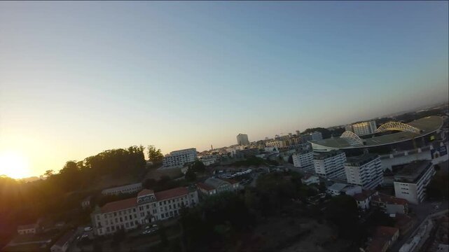 Cable-stayed bridge in Portugal near the Dragan stadium. Bird's eye view of the city at sunset