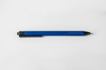 Blue pen on white background