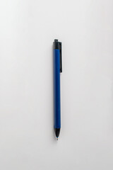 Blue pen on white background