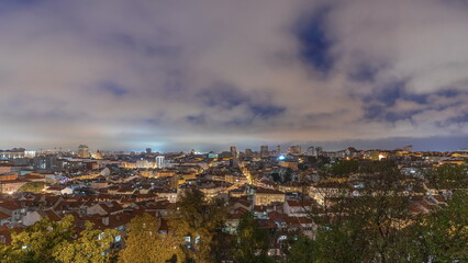 Panorama showing aerial view of downtown of Lisbon day to night transition timelapse, Portugal.