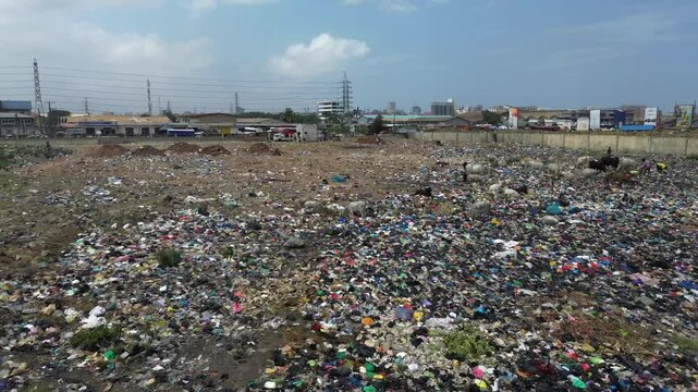 Ghana, Accra,   AGBOGBLOSHIE the largest landfill illegal dump in Africa for electronic and plastic waste from the Western world. High environmental toxic pollution area , climate change warming 