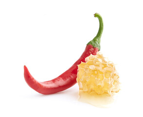 Honeycomb with chilli peppers in closeup
