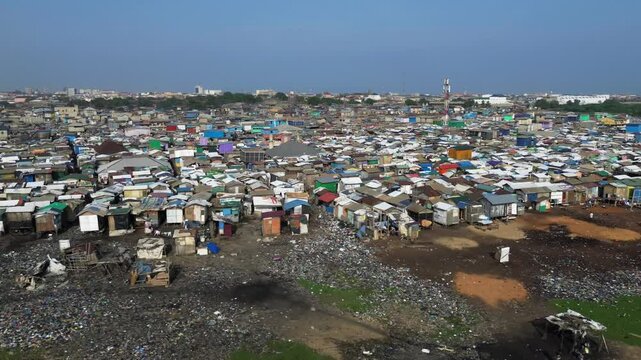 Ghana, Accra,   AGBOGBLOSHIE the largest landfill illegal dump in Africa for electronic and plastic waste from the Western world. High environmental toxic pollution area , climate change warming 