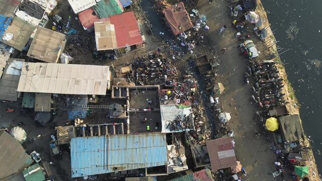 Ghana, Accra,   AGBOGBLOSHIE the largest landfill illegal dump in Africa for electronic and plastic waste from the Western world. High environmental toxic pollution area , climate change warming 