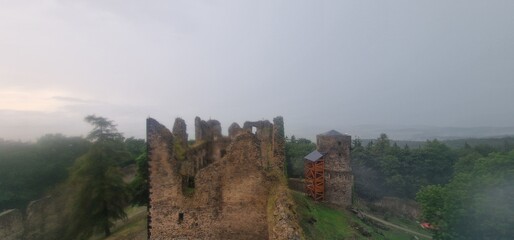 storm and rain comming at ruins of helfenburk castle bavorov