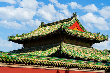 Fototapeta premium Decoration details of gates and palaces in the Temple of Heaven under blue sky, a major landmark and travel destination in Beijing, China