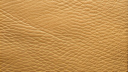 Fototapeta premium Close-up of golden leather texture with fine grain and wrinkles for luxury goods