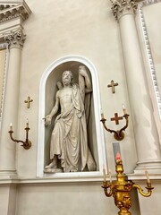 Sculptures of apostles and saints are placed in the niches of the walls of the Basilica of Saint Marin as if they are listening to your silent confession and forgiving your sins.