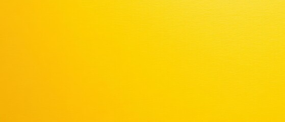 Obraz premium Bright yellow plain paper texture with a smooth finish