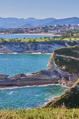View of the cliff from the observation deck of the Cabo Mayor lighthouse in the city of Santander,...