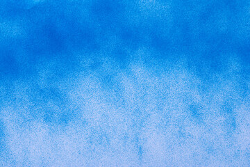 スプレー塗料で塗られた青色の背景