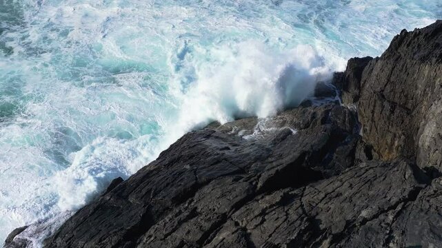Dramatic Scene Of Foamy Ocean Waves At Seixo Branco Beach Near Oleiros, A Coruna Province, Galicia, Spain. Slow Motion Shot