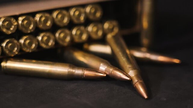 Extreme close up of ar-15 ammo out of the box.