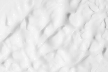 Texture of cosmetic cream covering the background. Skincare product, beauty care.