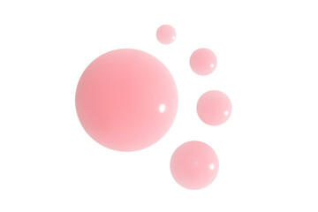 Drops of pink cream or gel on an empty background. Skincare product, beauty care.