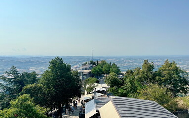 Panorama of the streets of San Marino surrounded by the blue horizon.