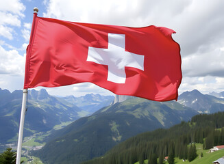 Swiss flag against mountain landscape. Panorama with waving red Swiss flag. Celebration of Swiss National Day. Travel, holiday and tourism concept.