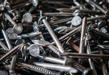 Close up of iron nails background , Piles of iron nails used in carpentry