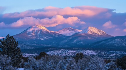Majestic Winter Landscape with Snowy Mountains at Sunset