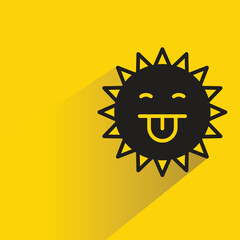 cheeky sun emoji with shadow on yellow background