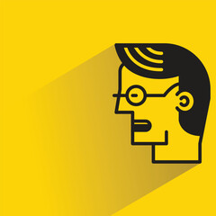 male face avatar with shadow on yellow background
