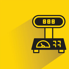 kitchen scale icon with shadow on yellow background