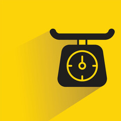 kitchen scale icon with shadow on yellow background