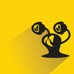 funny monster character with shadow on yellow background