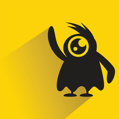 funny monster character with shadow on yellow background
