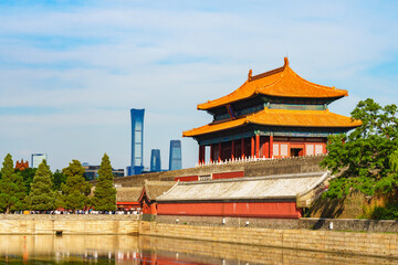 The Gate of Divine Prowess of the Forbidden City and the skyline of Beijing CBD (Central Business...