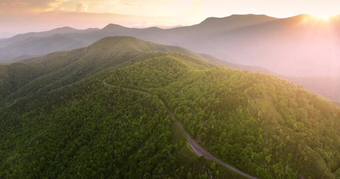 Landscape of beautiful nature. Blue Ridge Parkway road trip. Laurel Knob Overlook in evening Appalachian mountains landscape. Driving car exploration travel in summer forest in North Carolina