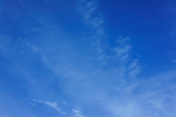 Captivating Sky Filled With Wispy Clouds in a Serene Blue Expanse During the Afternoon Light, Evoking Calmness and Wonder