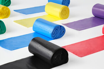 Close-up colorful dog poop bags. Responsibility and maintaining cleanliness in the city.