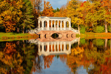 Marble bridge in autumn foliage in Catherine park, Pushkin (Tsarskoe Selo), Saint Petersburg, Russia