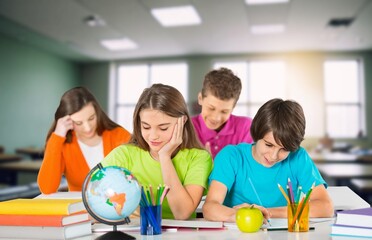 Happy kids students study at school.