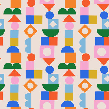 Fototapeta Abstract vintage style seamless pattern with colorful geometric shape decoration. Flat building block cartoon background, simple tower shapes in bright childish colors. Scandinavian concept print.