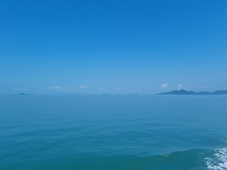 
It's a foggy blue sky and sea.