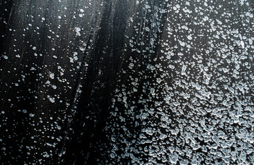 Acrylic background in various colors with abrasions. Scratch texture, art background in dark gray paints.