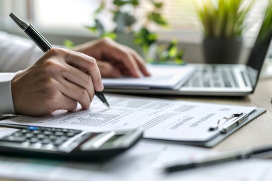 Close up businessman hands filling out form with pen