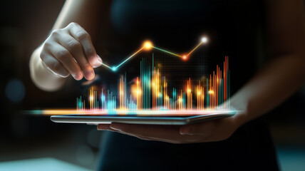 Hand interacting with digital financial graphs on a tablet, visualizing real-time data analytics, highlighting modern investment strategies and business technology innovation