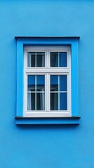 A single window with white frame on a wall