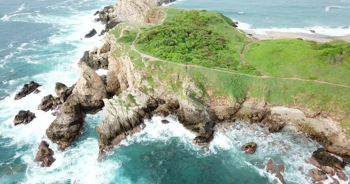 Drone flight over Punta Cometa viewpoint, southernmost point of Oaxaca, Mexico