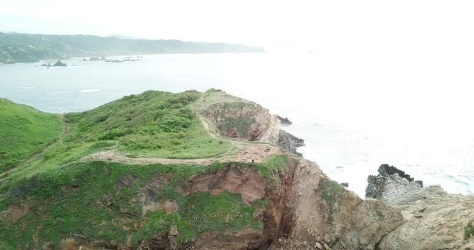 Drone flight over Punta Cometa viewpoint, southernmost point of Oaxaca, Mexico