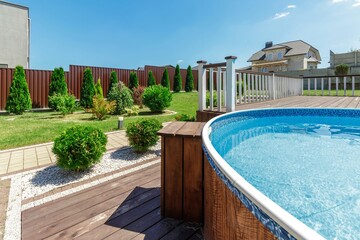 Cozy Backyard with Elevated Pool and Green Garden