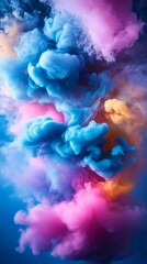 Fototapeta premium Colorful ink swirls underwater, creating vibrant abstract shapes and textures. Blue, pink, purple, and orange blend in a dynamic pattern, flowing like a cloud. Perfect for artistic projects