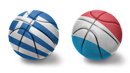 Fototapeta premium basketball balls with the national flags of greece and luxembourg on the white background.