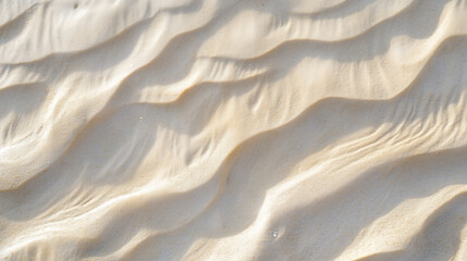 Obraz premium Close-up of Sand Patterns Sculpted by Wind on a Beach - Textured Natural Landscape