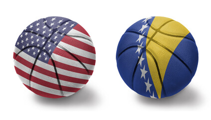 basketball balls with the national flags of united states of america and bosnia and herzegovina on...